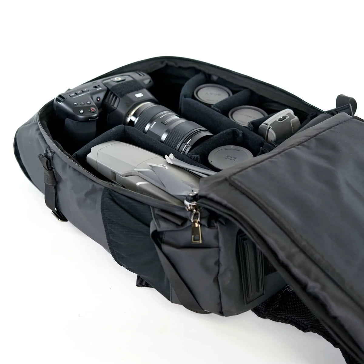 Sunny 16 Voyager Anti-Theft DSLR Digital Travel Camera Backpack Case with Adjustable Dividers and Side Access Zipper Pocket for Men Women- Works with , , and More (Tarpaulin, Black)