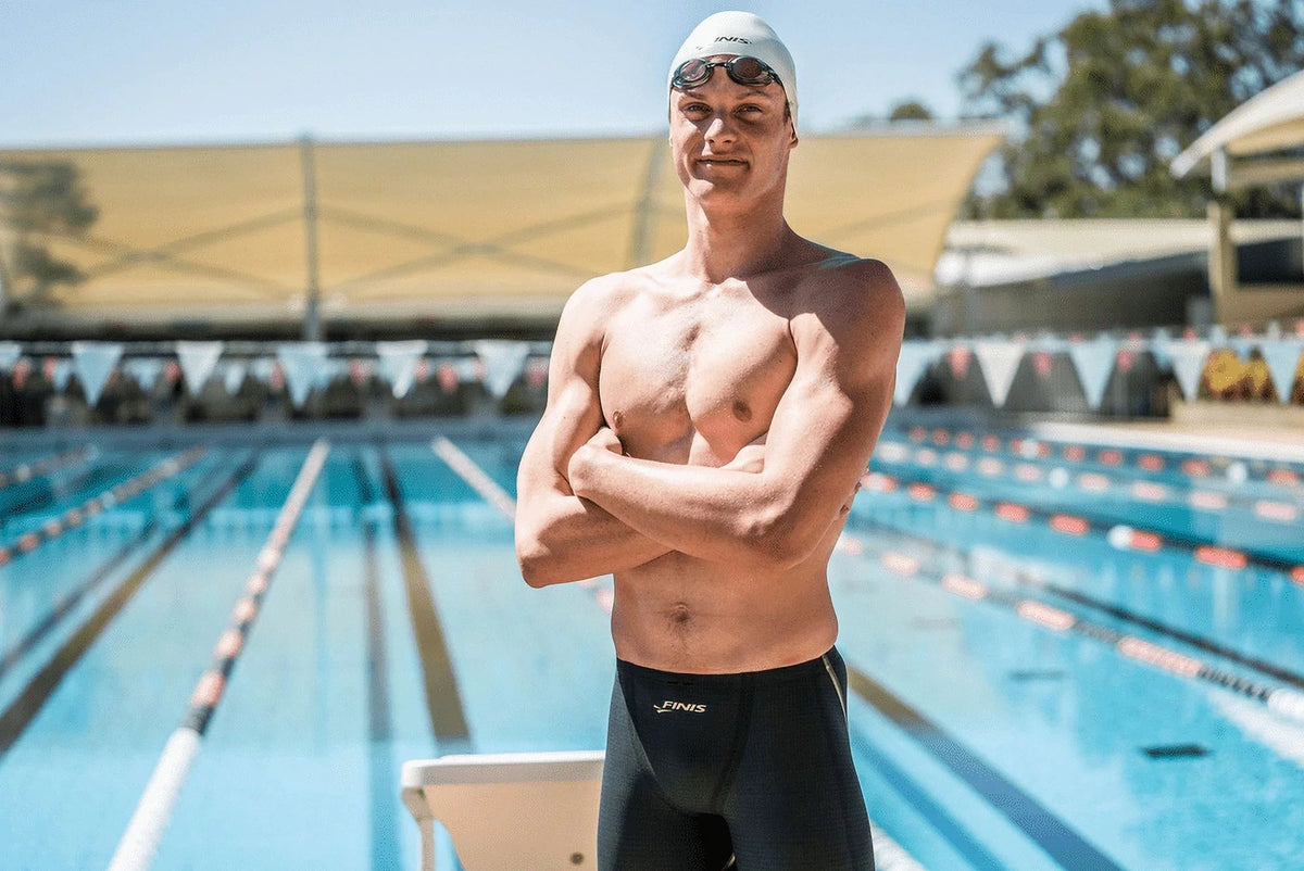 FINIS Lightning Goggles - Competitive Swim Goggles for Women and Men - Fluid Swimming Goggles with Adjustable Silicone Straps - Adult Swim Goggles with 4 Interchangeable Nose Pieces - Black/Smoke